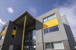 A photo of the outside of The Leigh UTC building.